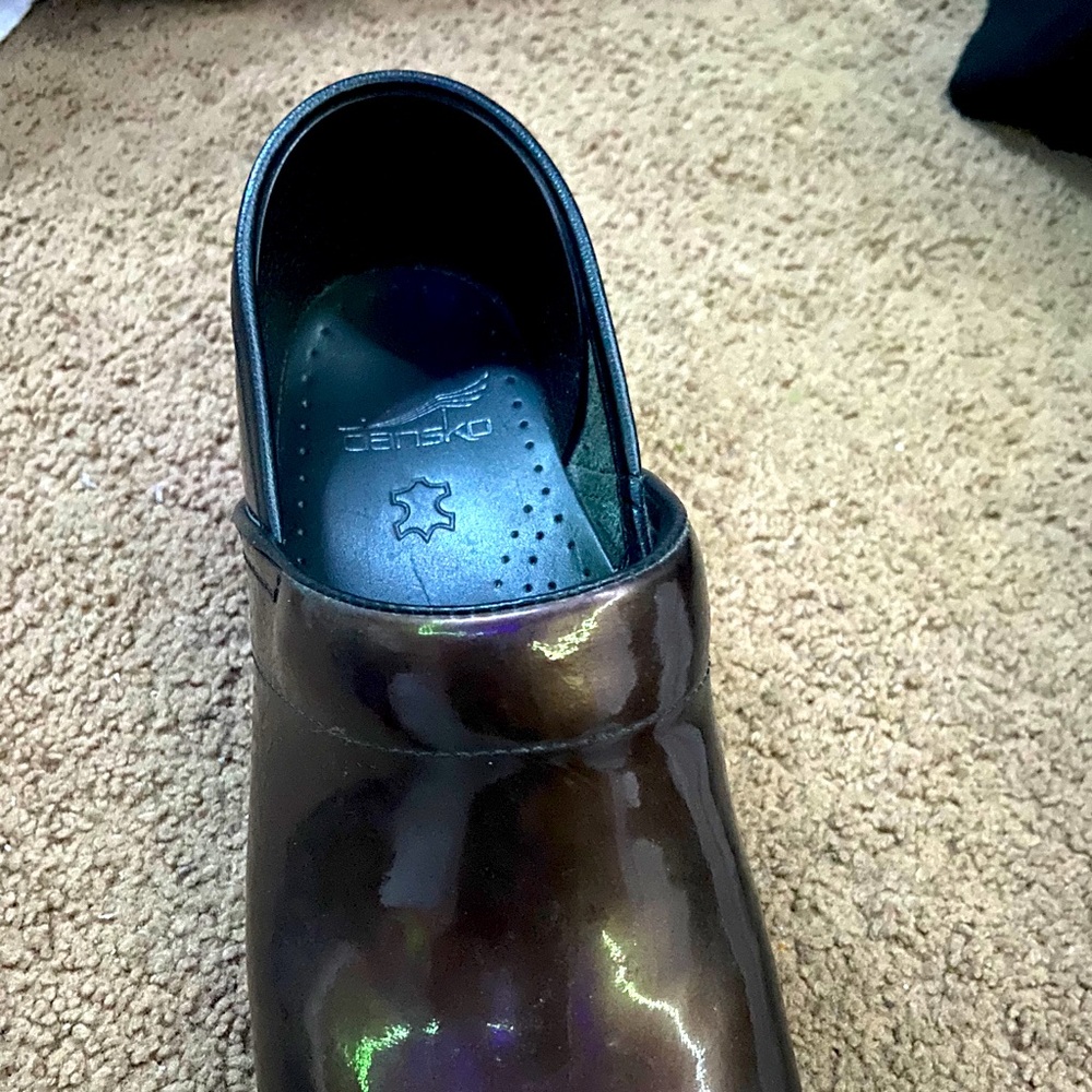 Dansko patent leather clogs